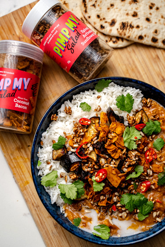 Flavourful Eggplant Dhal with Crispy Coconut Bacon and Spiced Super Seed Salad Toppers